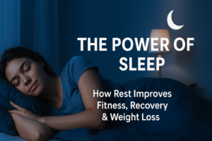 A young woman peacefully sleeping on her side in a cozy, dimly lit bedroom with soft blue tones. Text overlay reads “The Power of Sleep: How Rest Improves Fitness, Recovery & Weight Loss,” representing the connection between rest and physical wellness.